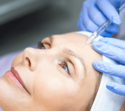 woman getting injections for a non surgical facelift at medi aesthetics
